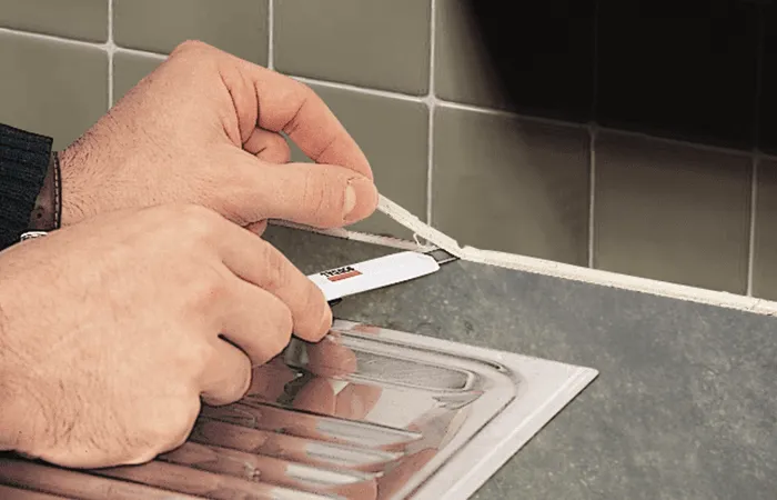 Step 2: Scrape Silicone away