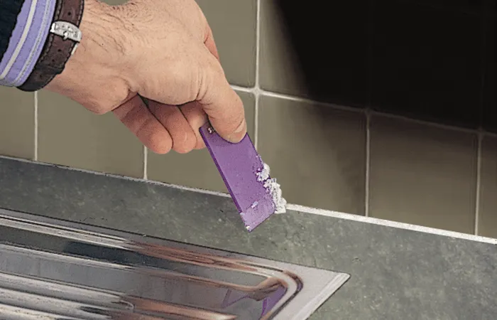 Step 4: Scrape Silicone Residue
