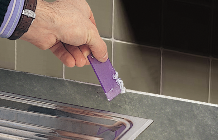 Step 4: Scrape Silicone Residue